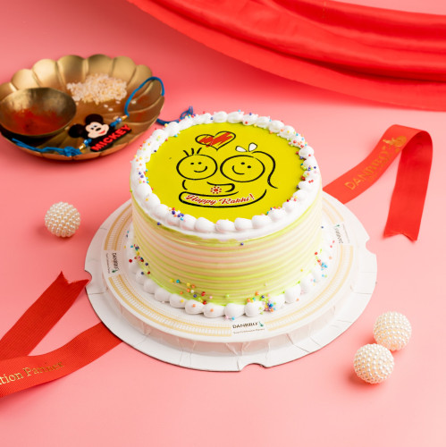 GjQGfPVMJJp18Z6hXBtPdEzj1ZWfD2leu8Nq4Uky Fresh Fruit Eggless Rakhi Cake – A Fruity Treat of Love - Image 1